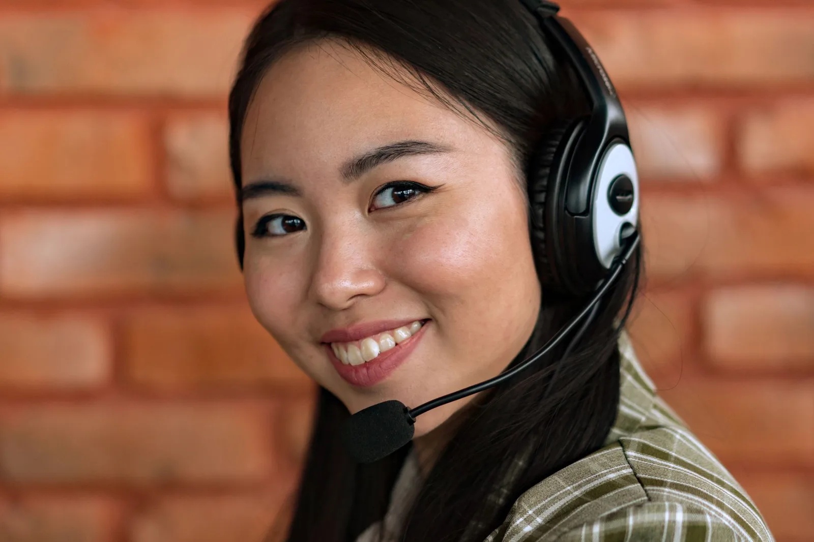 A customer service agent wearing a headset