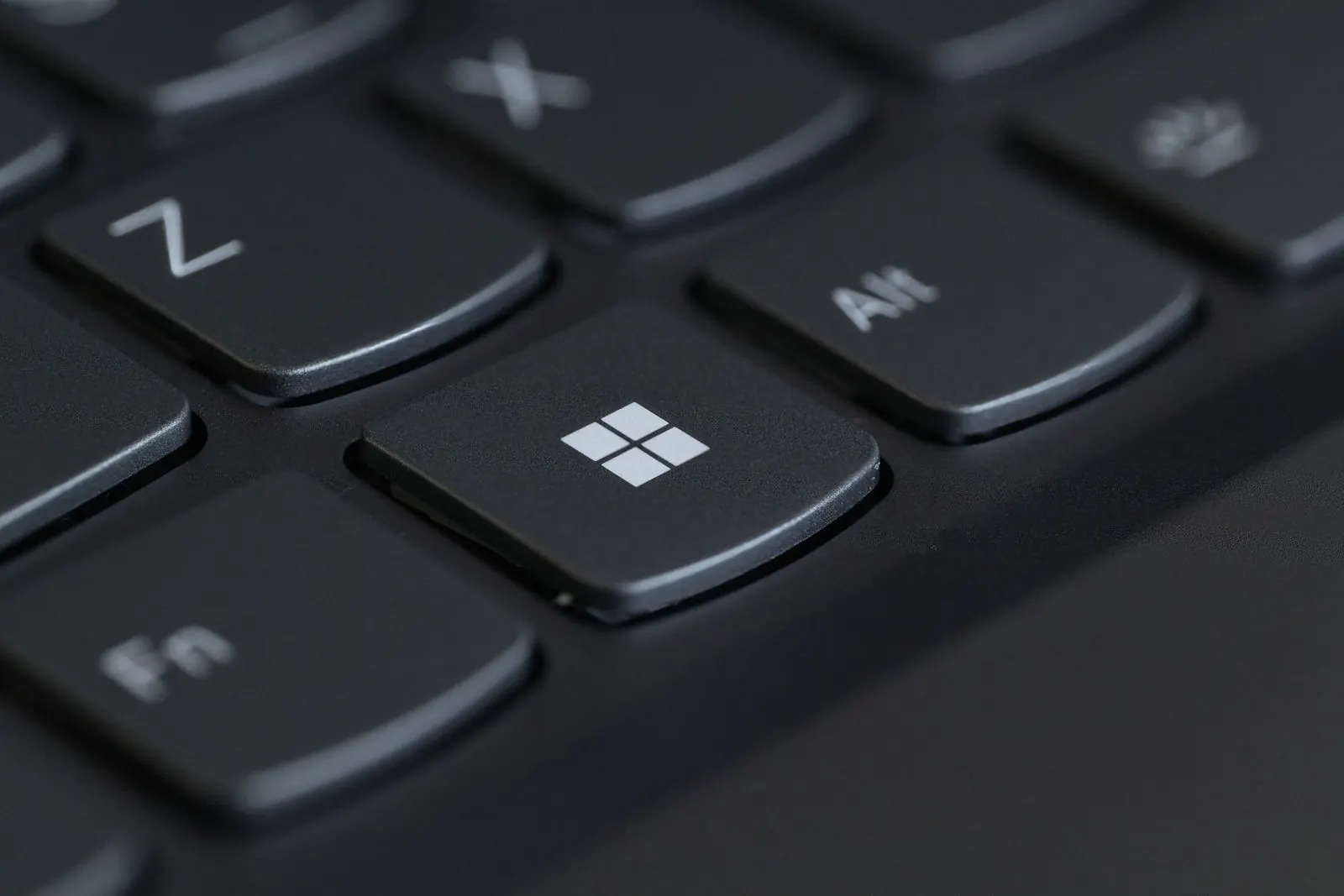 The Windows key on a business laptop keyboard